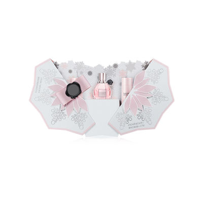 El copo de nieve forma las cajas de regalo del perfume