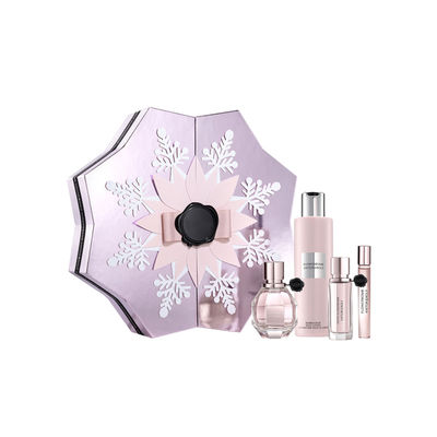 El copo de nieve forma las cajas de regalo del perfume